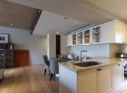 稳重大气日式风格110平米公寓厨房橱柜装修效果图